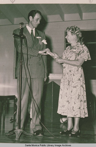 Bea Clark, the Society Editor for the "Palisadian"newspaper, with Ellis Taylor