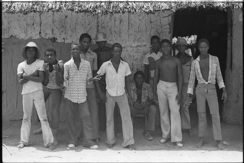 Young men sitting in front of building, San Basilio de Palenque, 1975