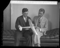 Eugene Biscailuz sitting with Richmond A. Edwards a member of Los Angeles' first sheriff airplane squadron