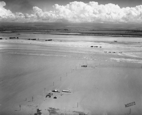 Flood of 1938, Aerial View of Homes in the Santa Ana River Break. [graphic]