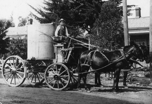 Rudy Fossek and his Horse-drawn Street Sprinkler Wagon, Anaheim [graphic]