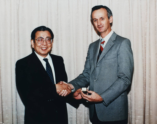 Frank Hirahara with Vice-President of Rockwell International [graphic]