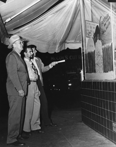 Anaheim Halloween Festival, Judging the Storefront Window Decorations. [graphic]