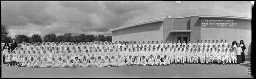 Group portrait of the 1957 Saint Christopher Church First Holy Communion Class