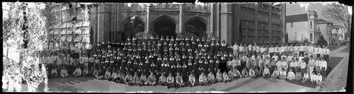 Father Collins with students at St. Joseph's School