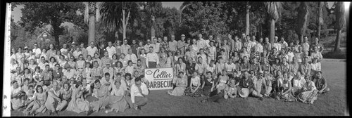 Group portrait of the attendees of the Collier Company barbeque