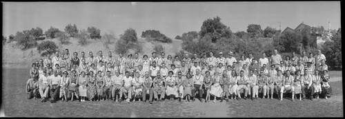 Group portrait of the attendees of the Collier Company barbeque