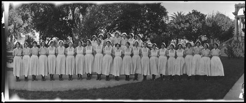 Nurses in front of a Hospital