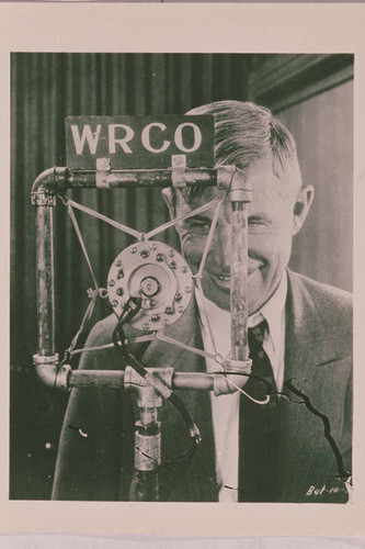 Will Rogers doing a radio broadcast for WRCO