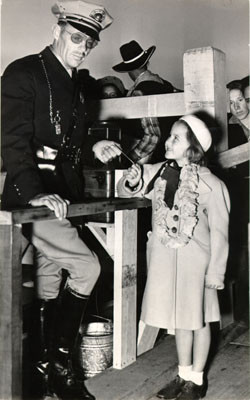 [Toll collector taking a ticket from Shirley Brown on Pedestrian Day at the Golden Gate Bridge]