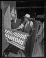 Charles M. Fuller and Harry Lee Martin examine the new Fuller Gold Dredge, Bakersfield, 1935