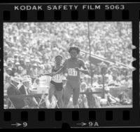 Jeanette Bolden and Clotee Cowans crossing finish line during 100 meter dash at the 1984 U.S. Olympic trials in Los Angeles, Calif