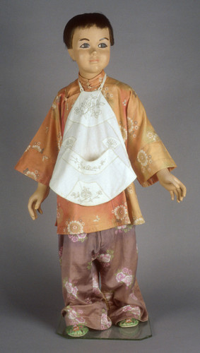 Jacket & trouser set (child) cotton. Jacket is red with flowers & trousers are blue with pink flowers. Chinese Circa 1870