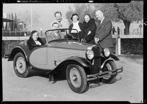 Aimee McShuser & Mr. Hutton & Austin car, Southern California, 1932