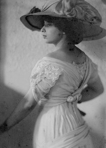 Marta Feuchtwanger as a young woman, late teens-early 20s, poses in a formal photograph, ca. 1905-1915