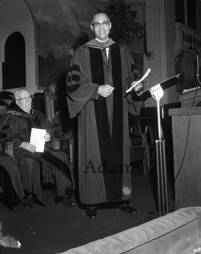 Dr. Thomas Kilgore, Jr. standing at the pulpit during his installation at Second Baptist Church, Los Angeles, 1964