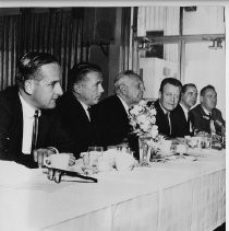 Goodwin Knight, Governor of California from 1953-1959, at a banquet with five unidentified men