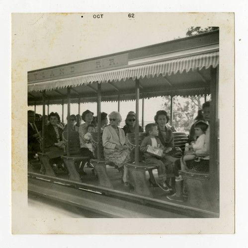 Takahashi family on train at Disneyland