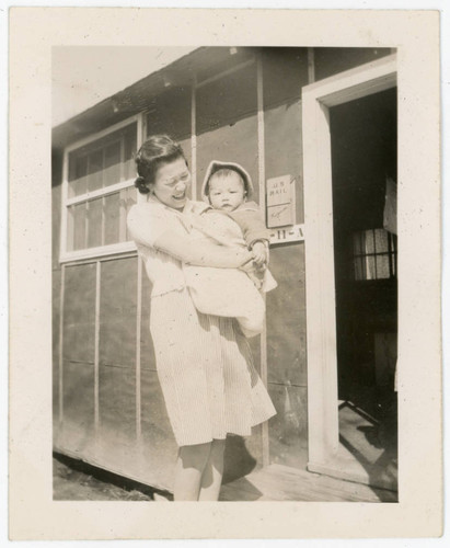 Woman holding baby at Jerome incarceration camp