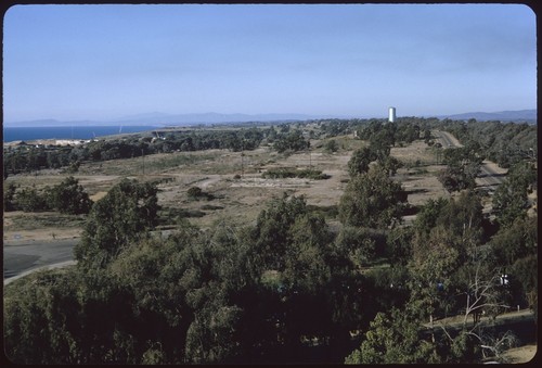 Future site of John Muir College, looking north across foundations of Camp Callan buildings with the Salk Institute for Biological Studies under construction