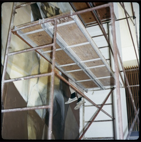 Howard Warshaw painting a mural in the Revelle Cafeteria