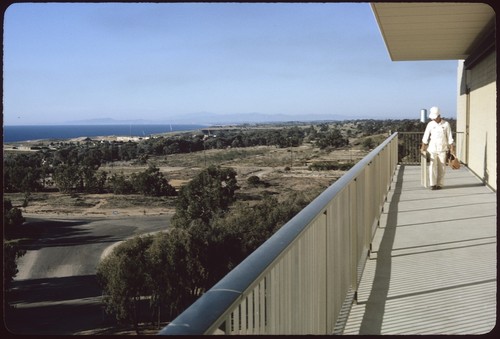 Future site of John Muir College, looking north across foundations of Camp Callan buildings with the Salk Institute for Biological Studies under construction