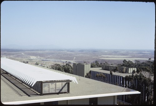 Mayer Hall and roof of York Hall, looking southeast, with Interstate 5 interchange in the background