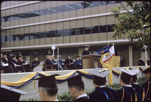 A speaker addresses the audience at Chancellor John Galbraith's inauguration ceremony