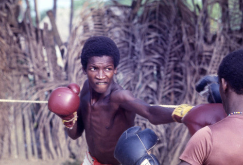 Men boxing in boxing ring, San Basilio de Palenque, 1976