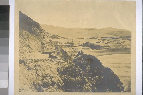 View from Cliff House, 1865. Golden Gate Park not planted yet, just sand hills. Only residences Seal Rock house and a few small houses