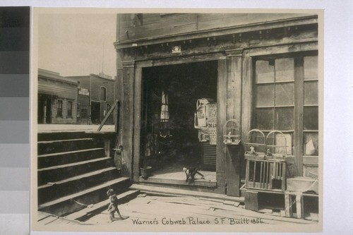 Abe Warner's Cobweb Palace, a Saloon (formerly a butcher shop), 1856. Francisco St.--where the monkeys and parrots of Abe Warner ran free. Sapolio Soap ad over saloon door. [Duplicate of 10:119.]