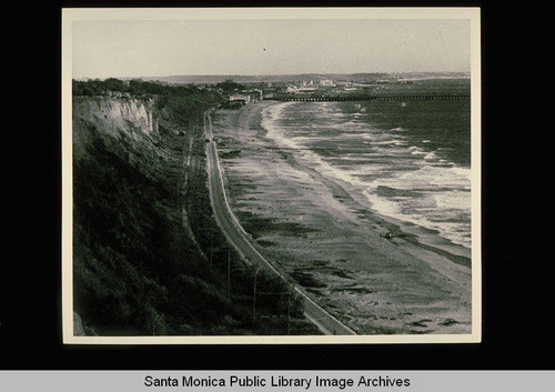 Looking south along the coast road to the Santa Monica Municipal Pier and Merry-Go-Round