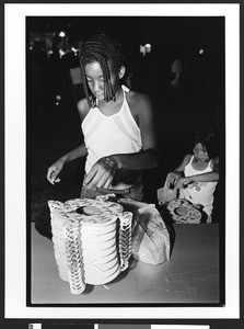 Young black girl visits Harvest Moon Festival, Tet Trung Thu, San Jose, California, 2002
