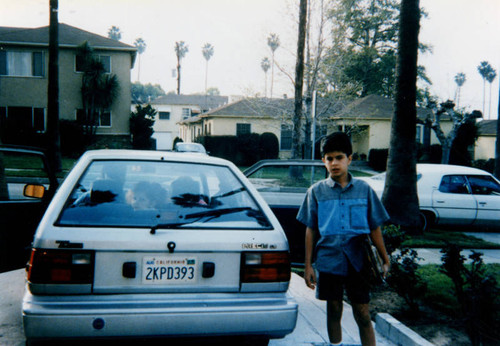 Ali Reza with car in driveway
