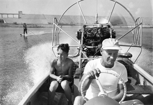 Co-builder Bill Lehman, Sunland sportsman, steers air boat on Hansen Dam Lake