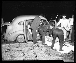 Dead in auto, 1955