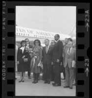 Tom Bradley and Israeli Prime Minister Yitzhak Rabin with their wives upon Rabin's arrival at airport in Los Angeles, Calif., 1976