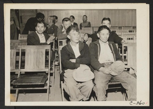 Byron, California--Laborers of Japanese ancestry from a large-scale asparagus ranch are at the WCCA station awaiting their turn to be interviewed prior to evacuation. Photographer: Lange, Dorothea Byron, California
