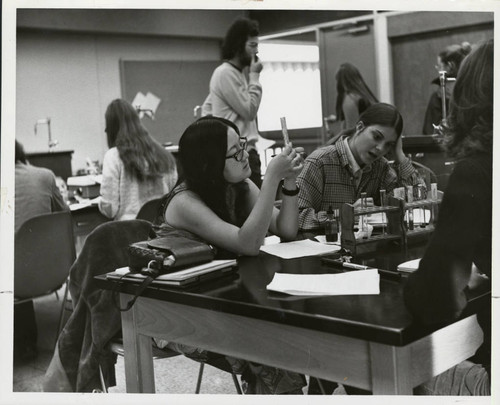 Two women in a science lab, Scripps College