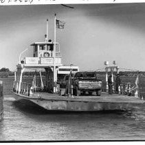 Caption reads: " The Victory II Ferry nears dock at a Delta island stopping point, carrying vehicular cargo