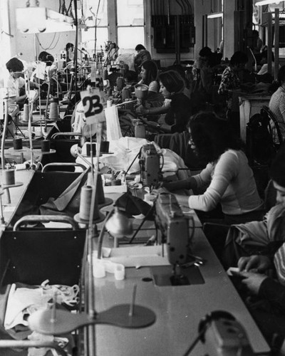 Garment workers apply their trade