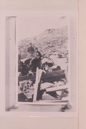 Motor of boat before cabin was added to close it in from weather. The large scow operated on the Colorado River by the Moab Garage Company