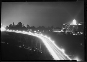 Arroyo Seco bridge and Vista Del Arroyo hotel at night, Christmas lights, Pasadena, CA, 1930