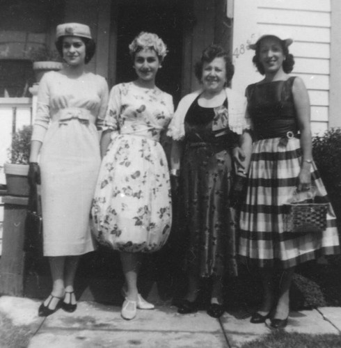 Armenian American women and friend in front of house