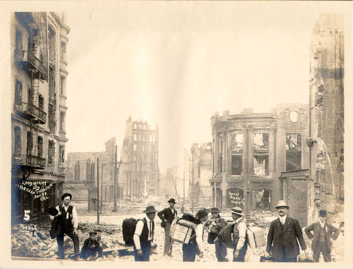 [Group of men standing near the ruins of the Tivoli Opera House at Ellis and Mason streets]