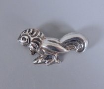Silver bird brooch