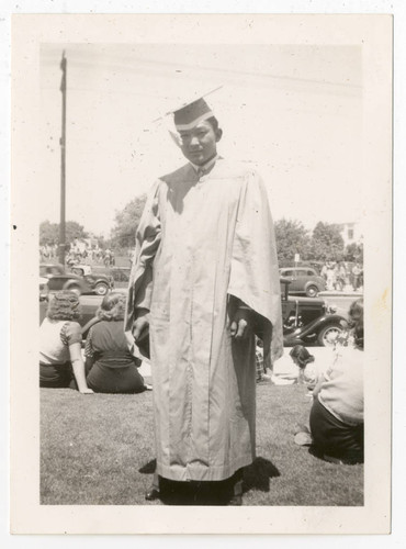 Young man in cap and gown