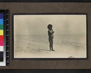 Child standing on beach, Mailu, Papua New Guinea, ca. 1905