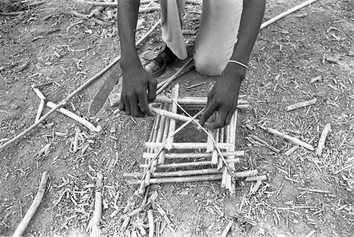 Alfredo Torres crafting a trap, San Basilio de Palenque, 1977