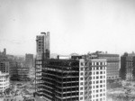 [Monadnock Building during reconstruction. Intersection of Market, Third, Kearny and Geary Sts., left]